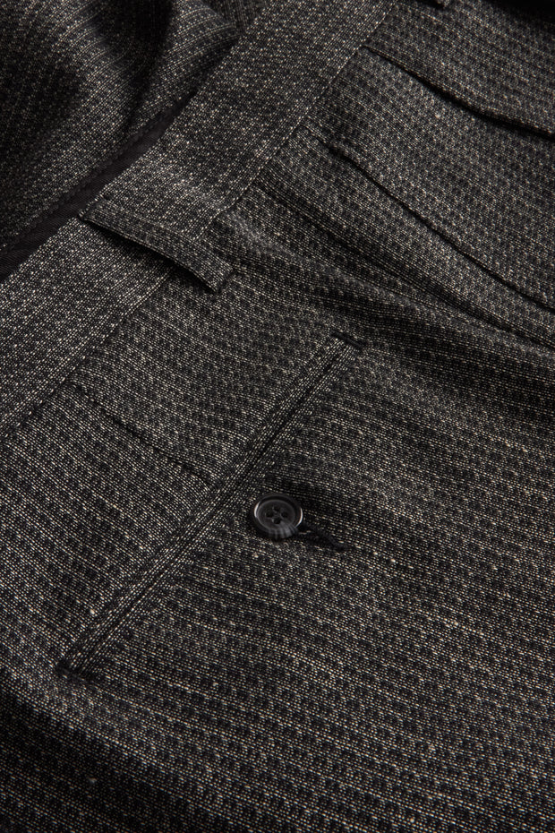 pantalon luca à plis en laine motif caviar noir et cendre