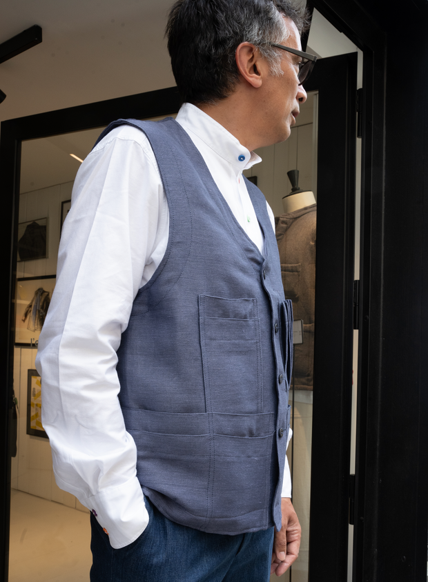 20-pocket waistcoat in a double-faced parma over navy cotton and linen twill