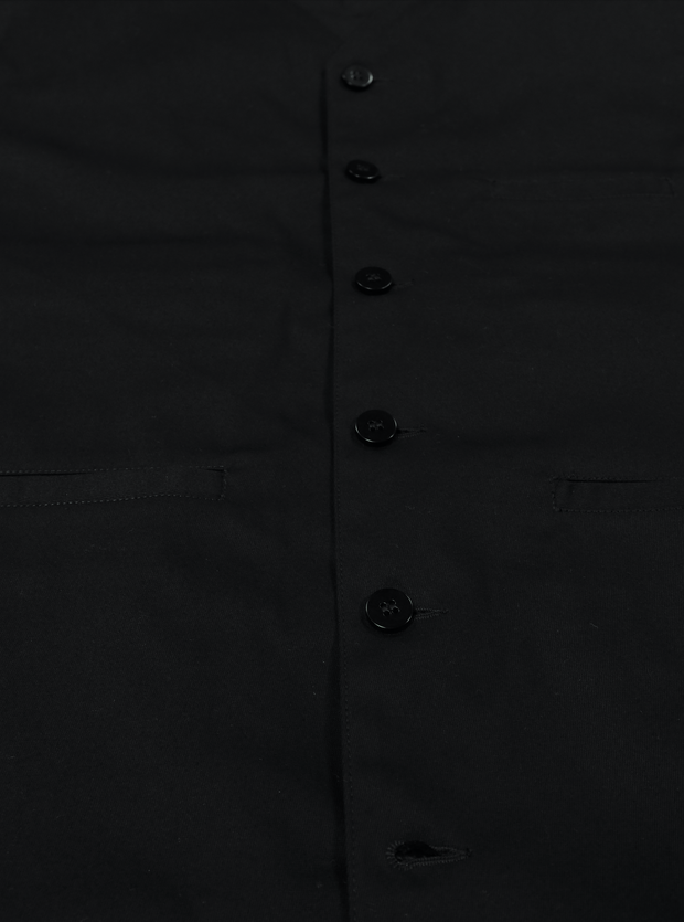 gilet à poches passepoilées en serge de coton noire
