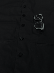 gilet à poches passepoilées en serge de coton noire