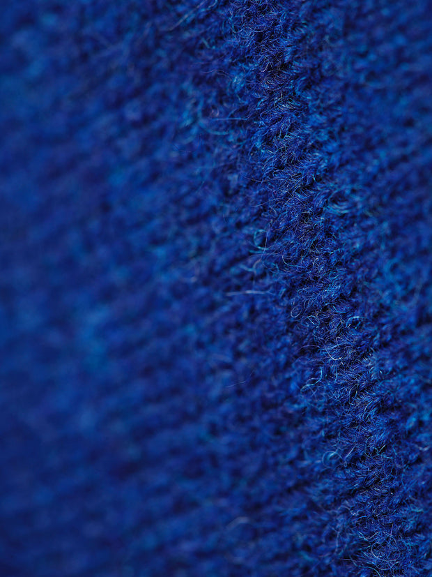 blue polo-neck jumper in lambswool