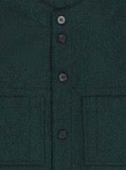 sleeveless jacket in emerald green and black super-soft tweed