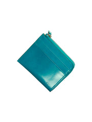 portefeuille zippé en cuir bleu peacock