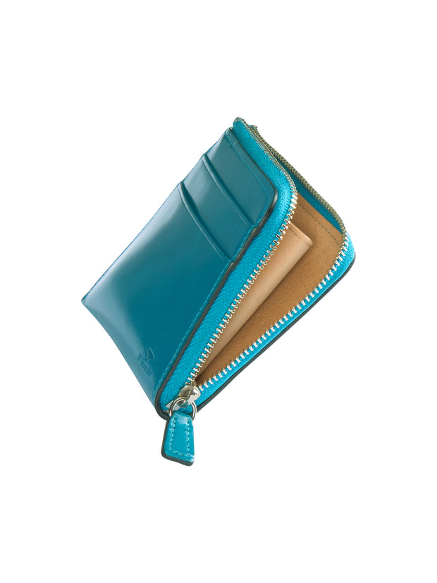 portefeuille zippé en cuir bleu peacock