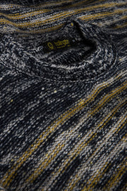 pull Inis Meain à col cheminée en laine et cachemire à rayures irrégulières marine et jaune